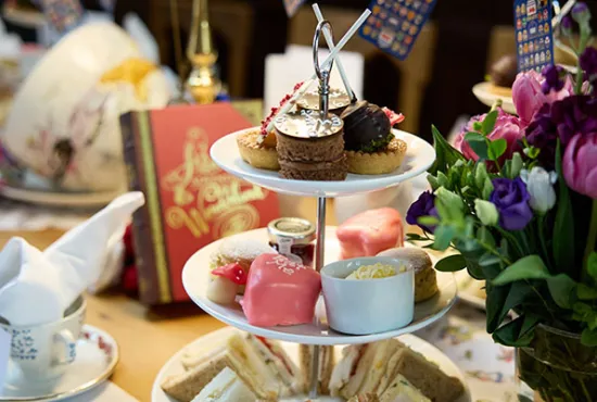 Detail of a table in Hall laid for an Alice Tea