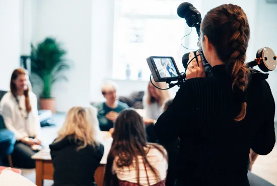 A discussion being filmed