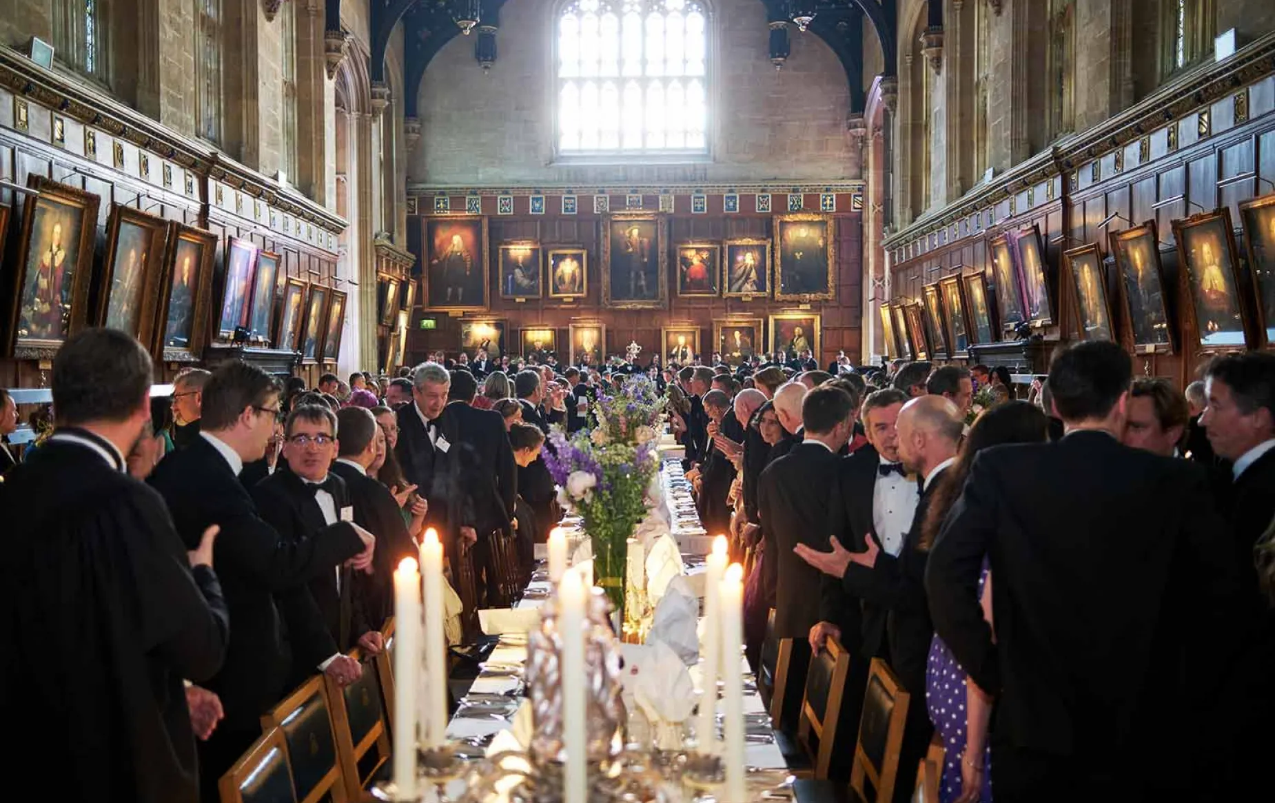 Alumni at a dinner in the Great Hall