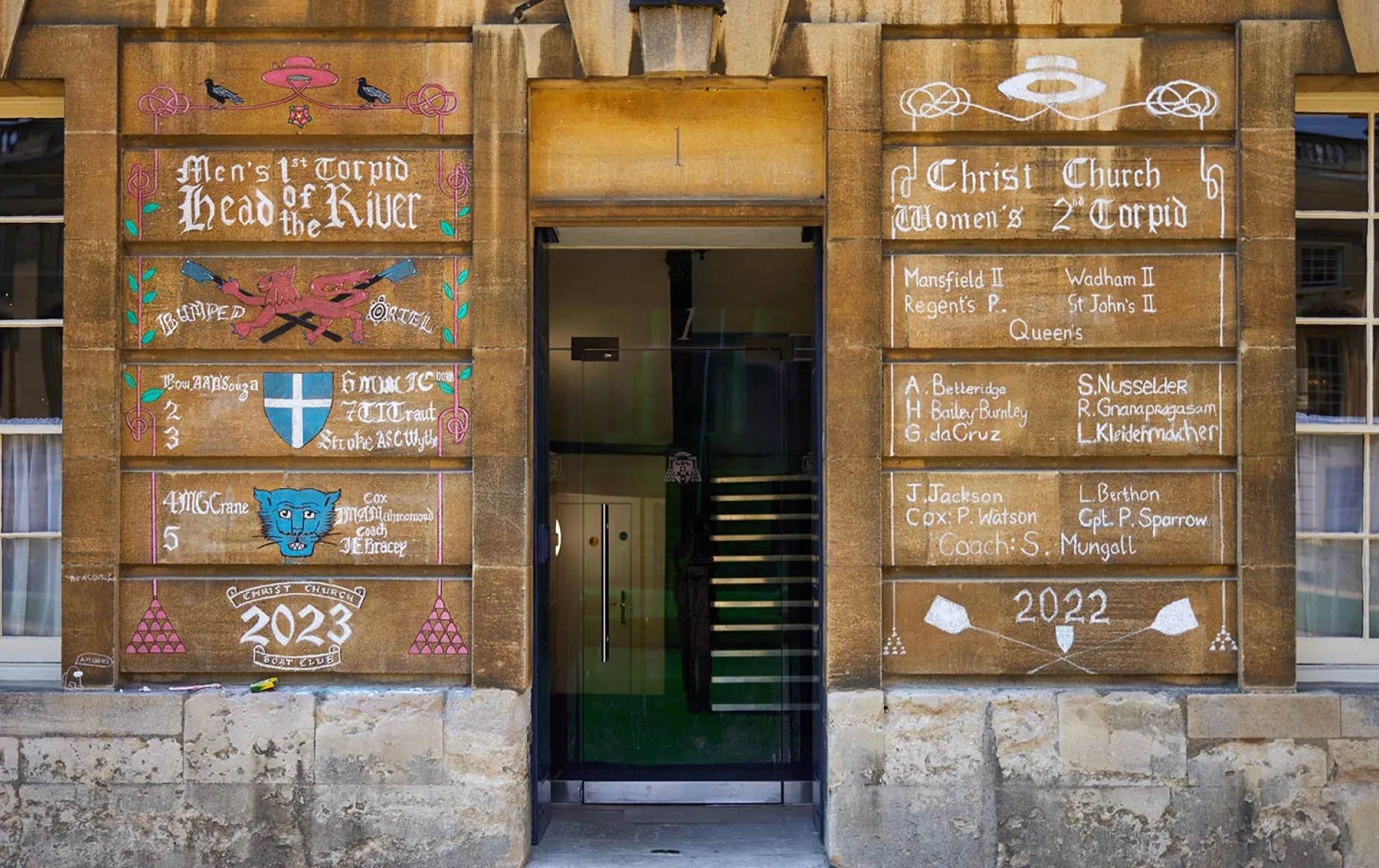 Sporting achievements chalked onto the walls of Peck Quad