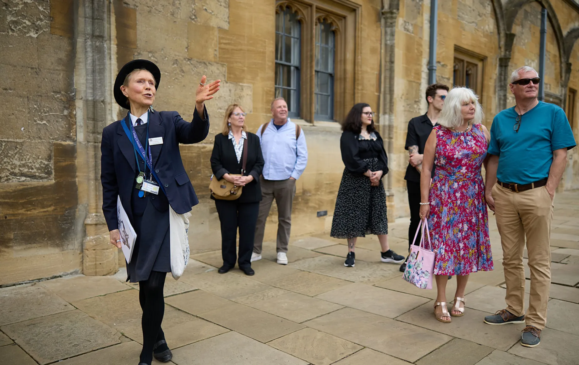 Custodian giving a guided tour of College