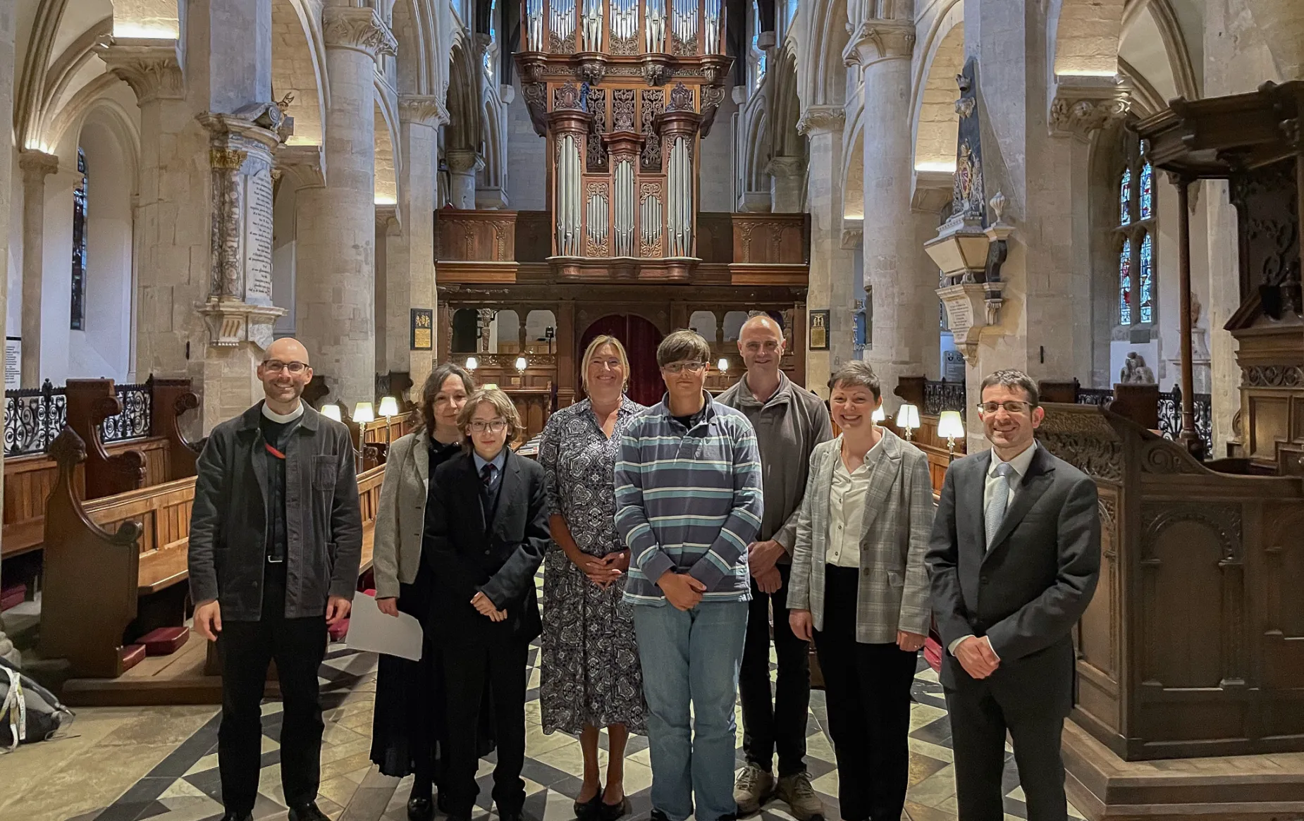 YOST Scholars and families in the Cathedral nave with Revd Zack Guiliano, Roxanne Gull, and Nicholas Prozzillo
