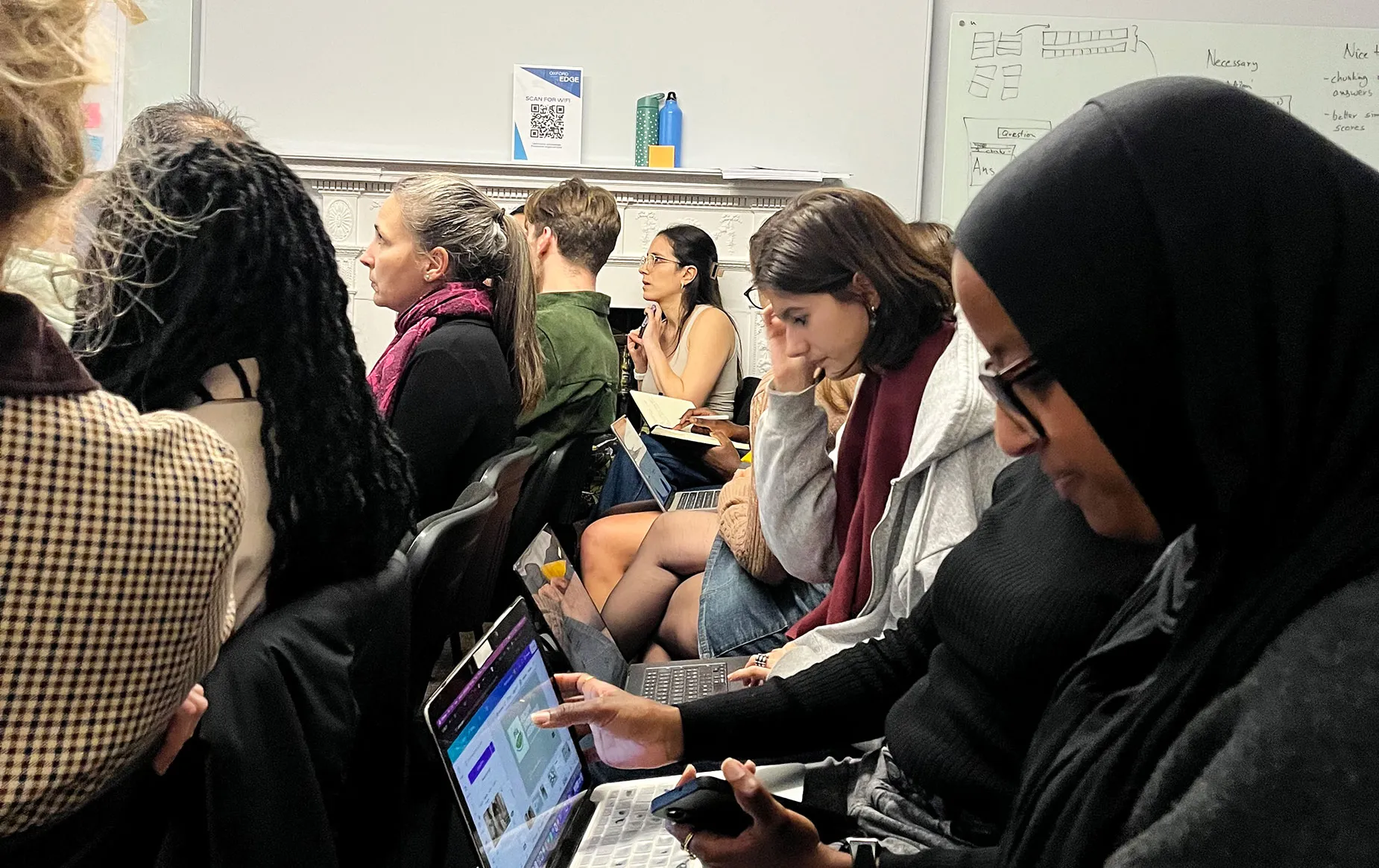 Attendees participating in a group session at Oxford Edge