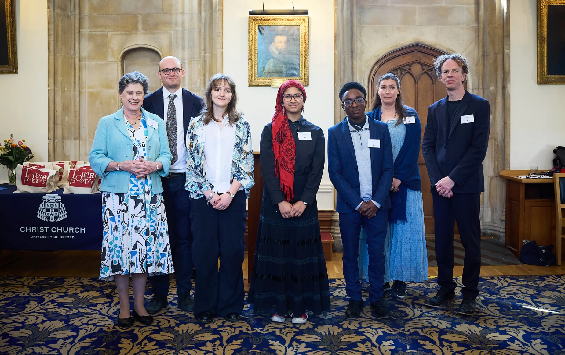 The winners with the judges and the Dean