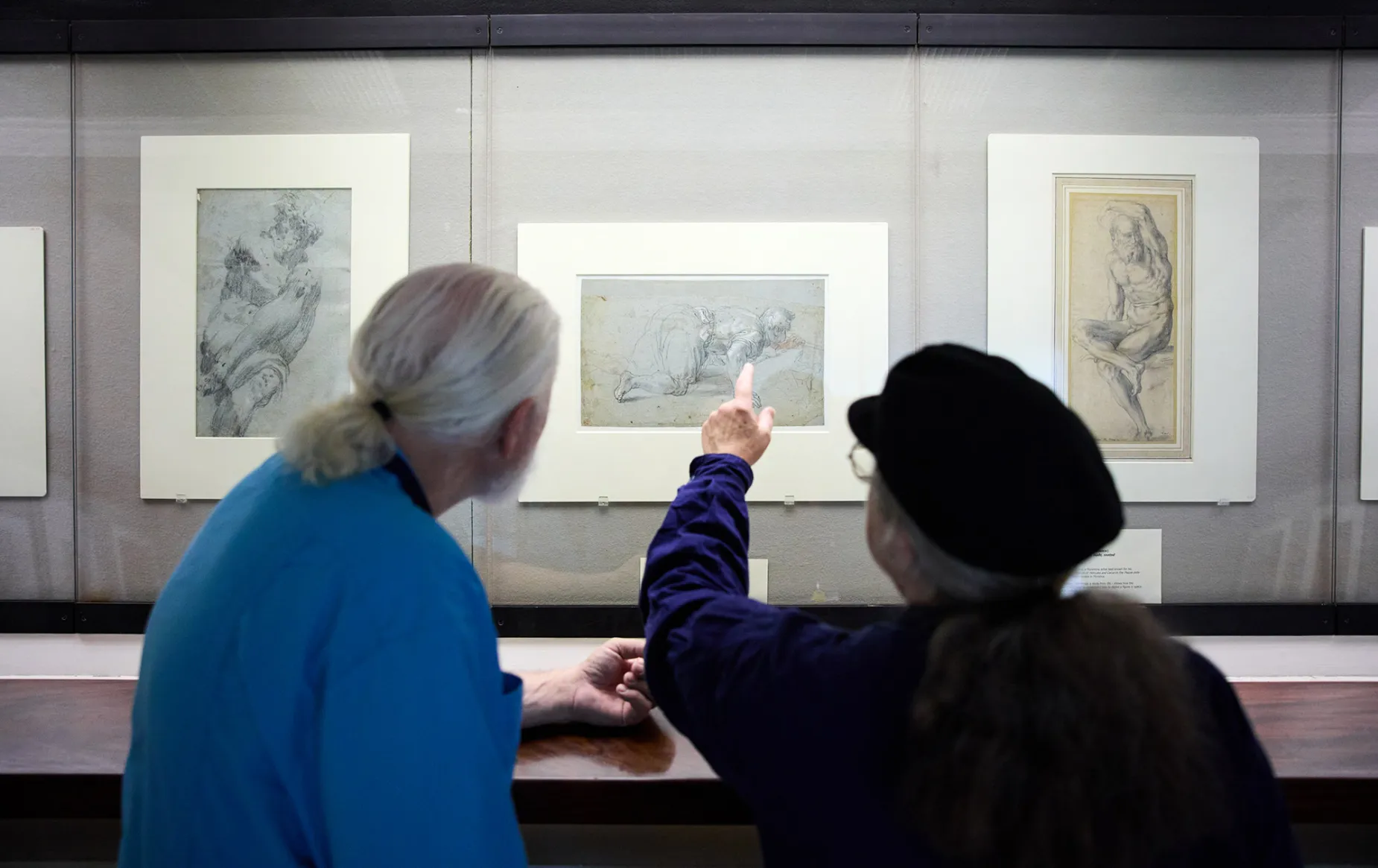 Visitors admiring drawings in the Picture Gallery