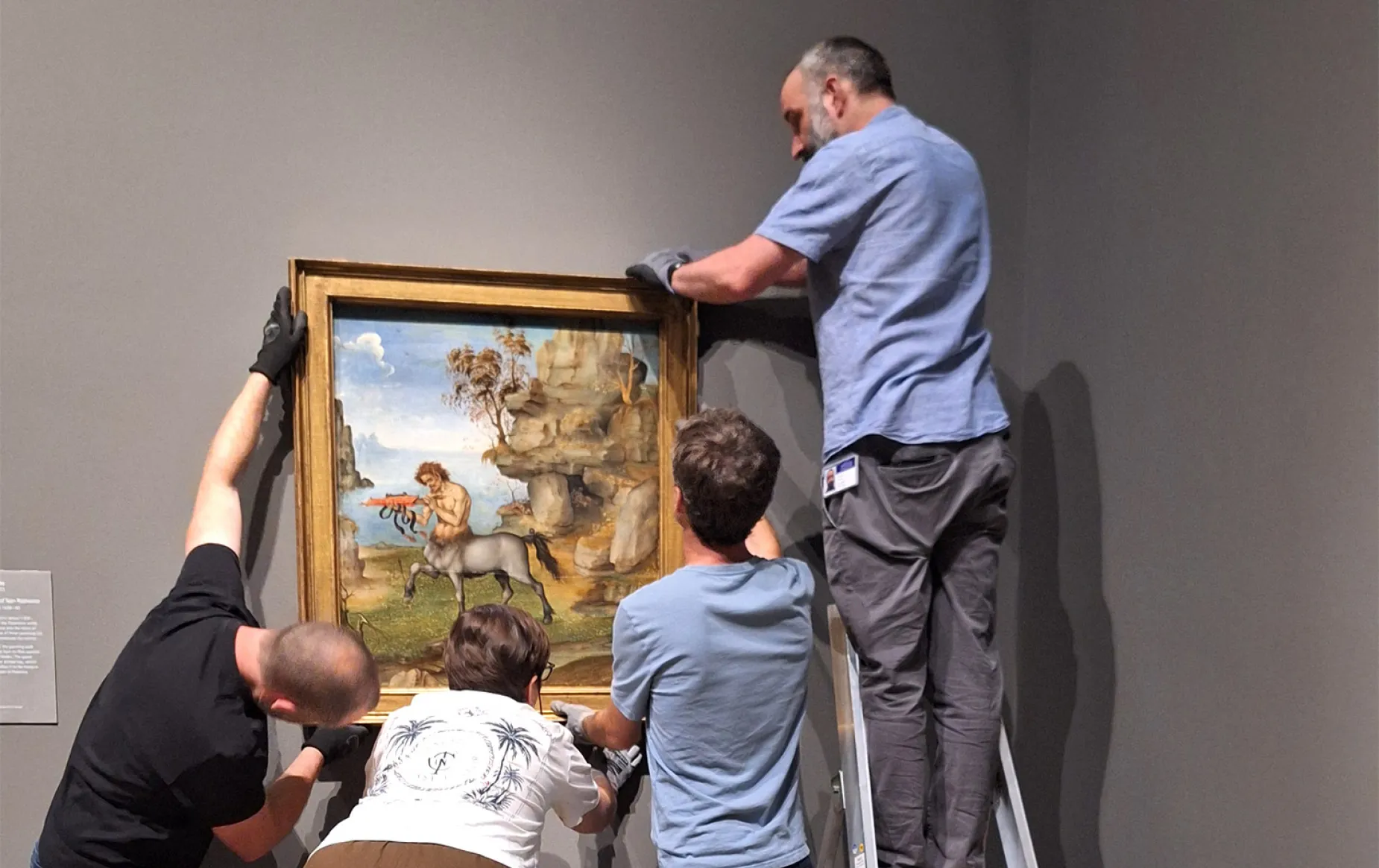 'The Wounded Centaur' being hung in the National Gallery