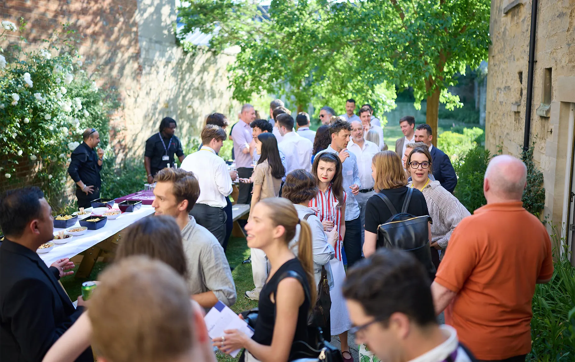 Event reception taking place in the garden space at Oxford Edge