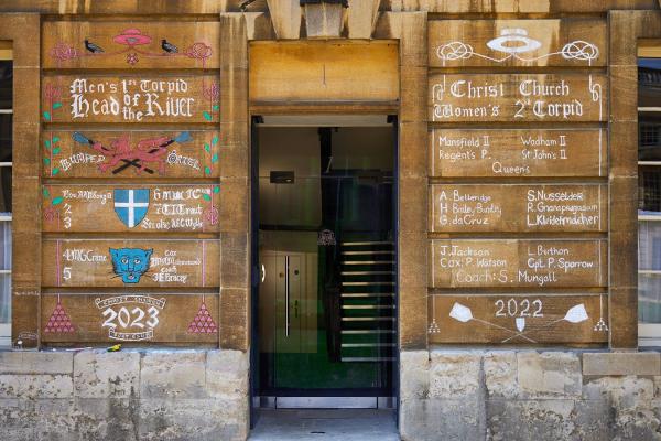 Sporting achievements chalked onto the walls of Peck Quad