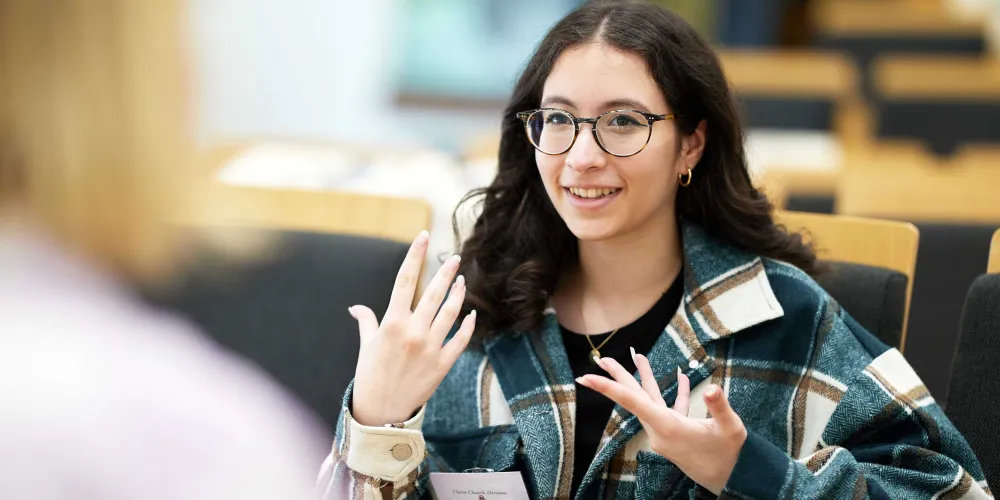A student attending an outreach event