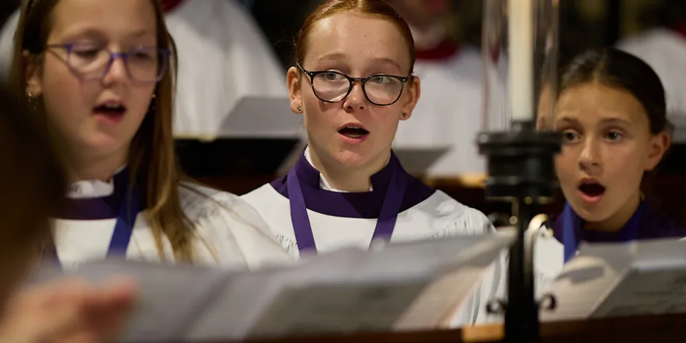 Frideswide Voices singing in the choir stalls
