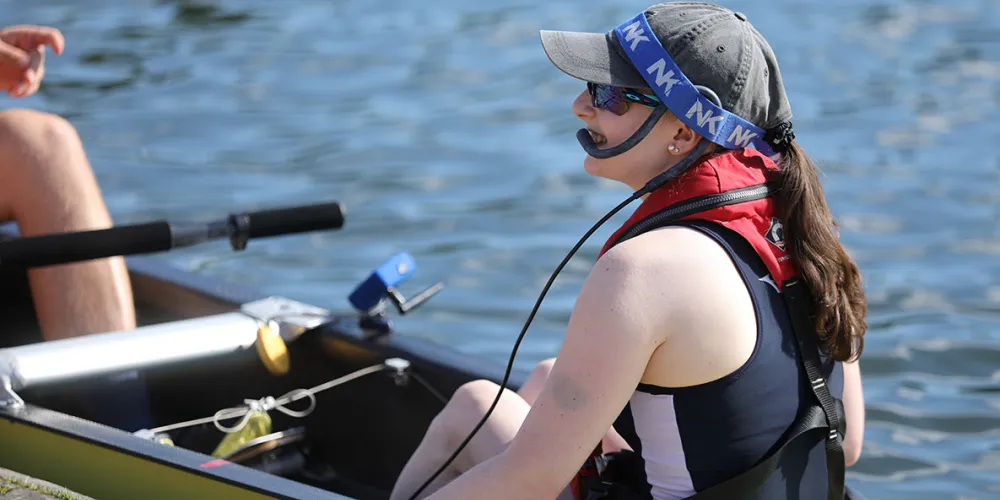 A cox in a boat
