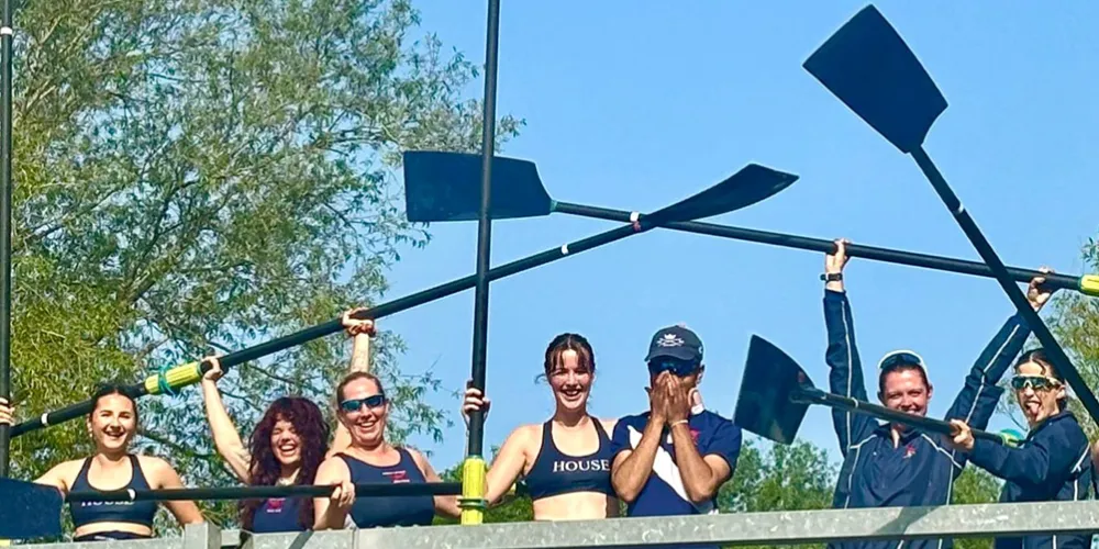 A crew celebrating their performance