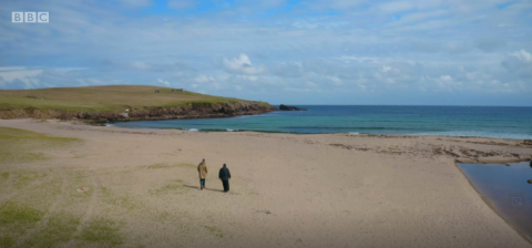 Ben Fogle walks on a beautiful beach in the Shetland islands next to Mother Mary, an orthodox nun dressed in black.