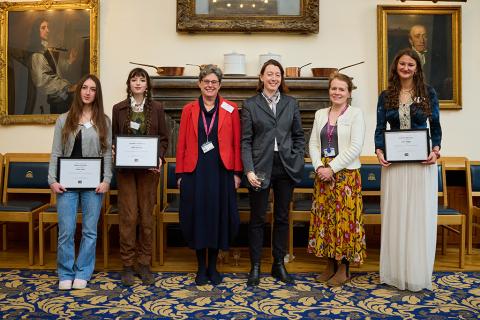 The 2025 Tower Poetry Competition winners with the Dean and judges