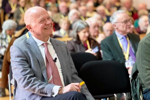 Oxford Chancellor Lord Hague listens to a speaker