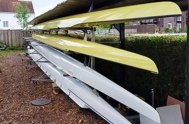Some boat shells stored on racking