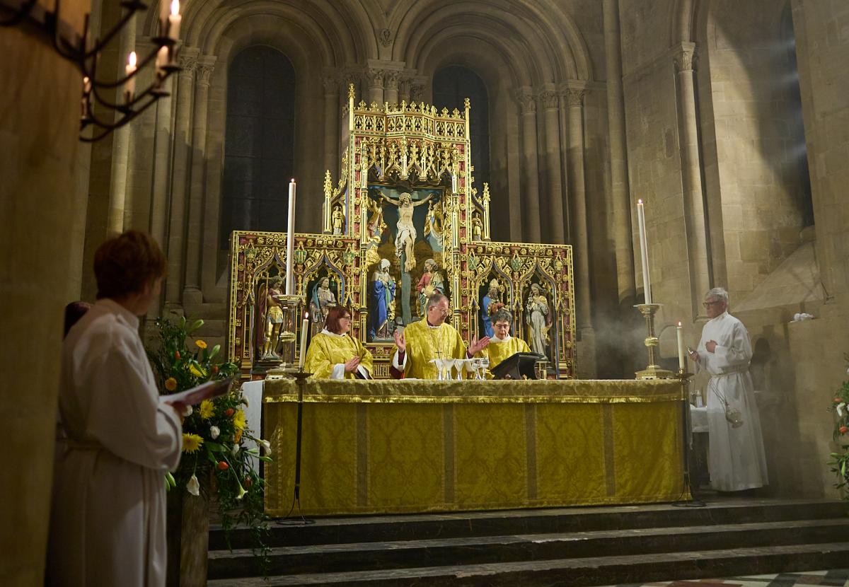 The Bishop of Oxford, The Rt Revd Dr Steven Croft, the Dean, The Very Revd Professor Sarah Foot, and Revd Philippa White celebrate communion during the 2023 Easter Vigil service