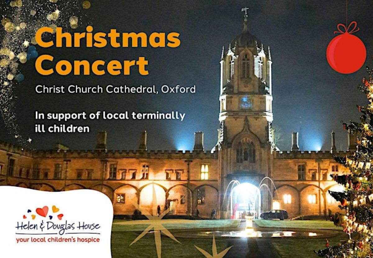 Banner image for the Helen and Douglas House Christmas concert of a dark but warmly lit Tom Quad with Christmas Tree