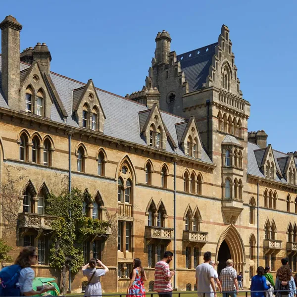 Visitors passing in front of Meadows building