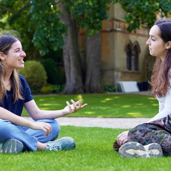 Students relaxing in the Masters Garden