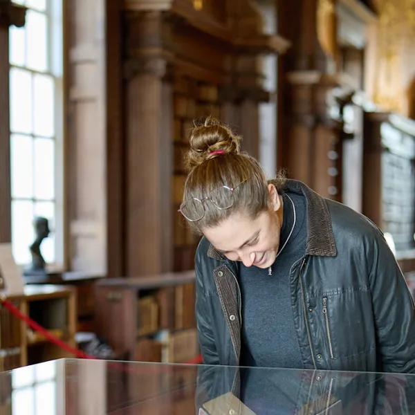 Visitors enjoying a display in the Upper Library