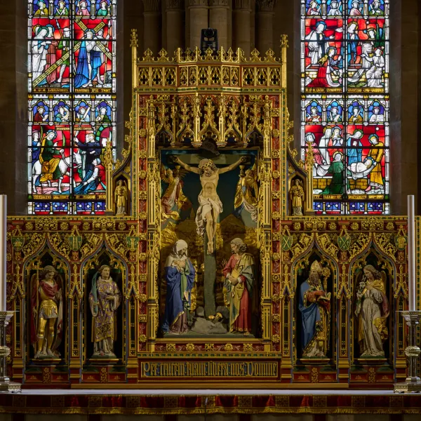 Golden High altar of Christ Church Cathedral, showing Christ on the Cross with Mary Magdalen and the Blessed Virgin Mary grieving at his feet