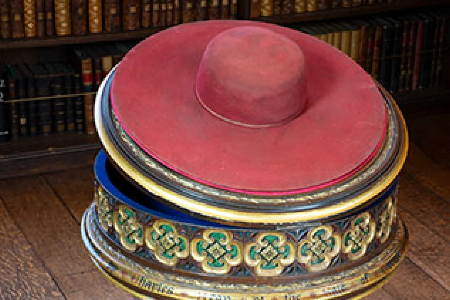 Cardinal Wolsey's Hat on its stand in the Upper Library