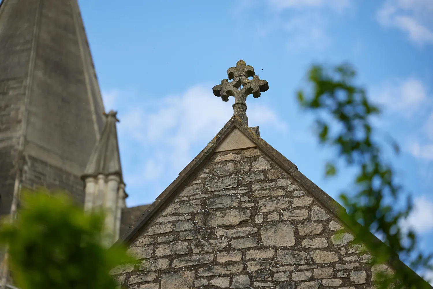 A stone cross on a roof of Christ Church Cathedral