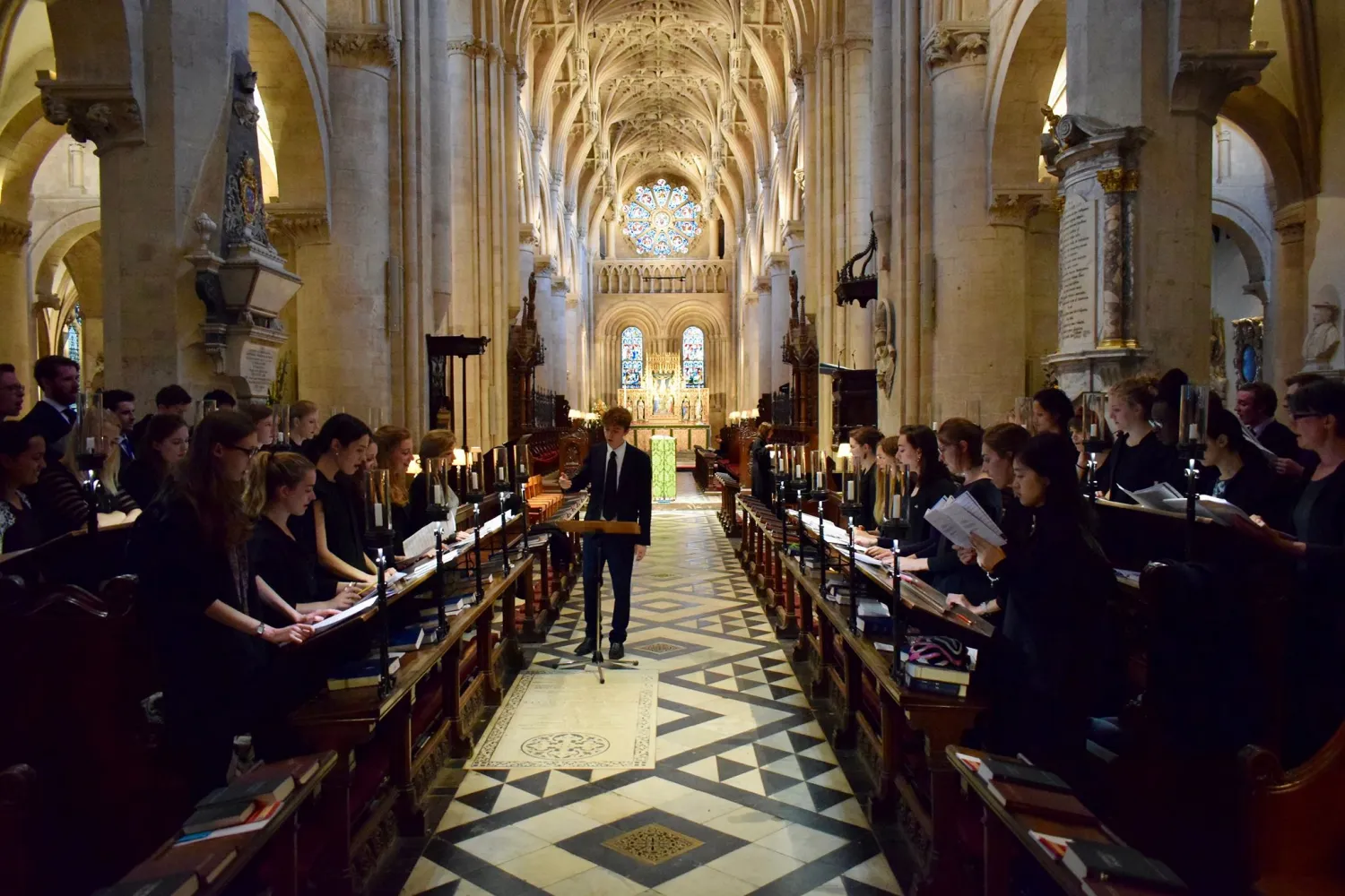 The College choir singing in the nave