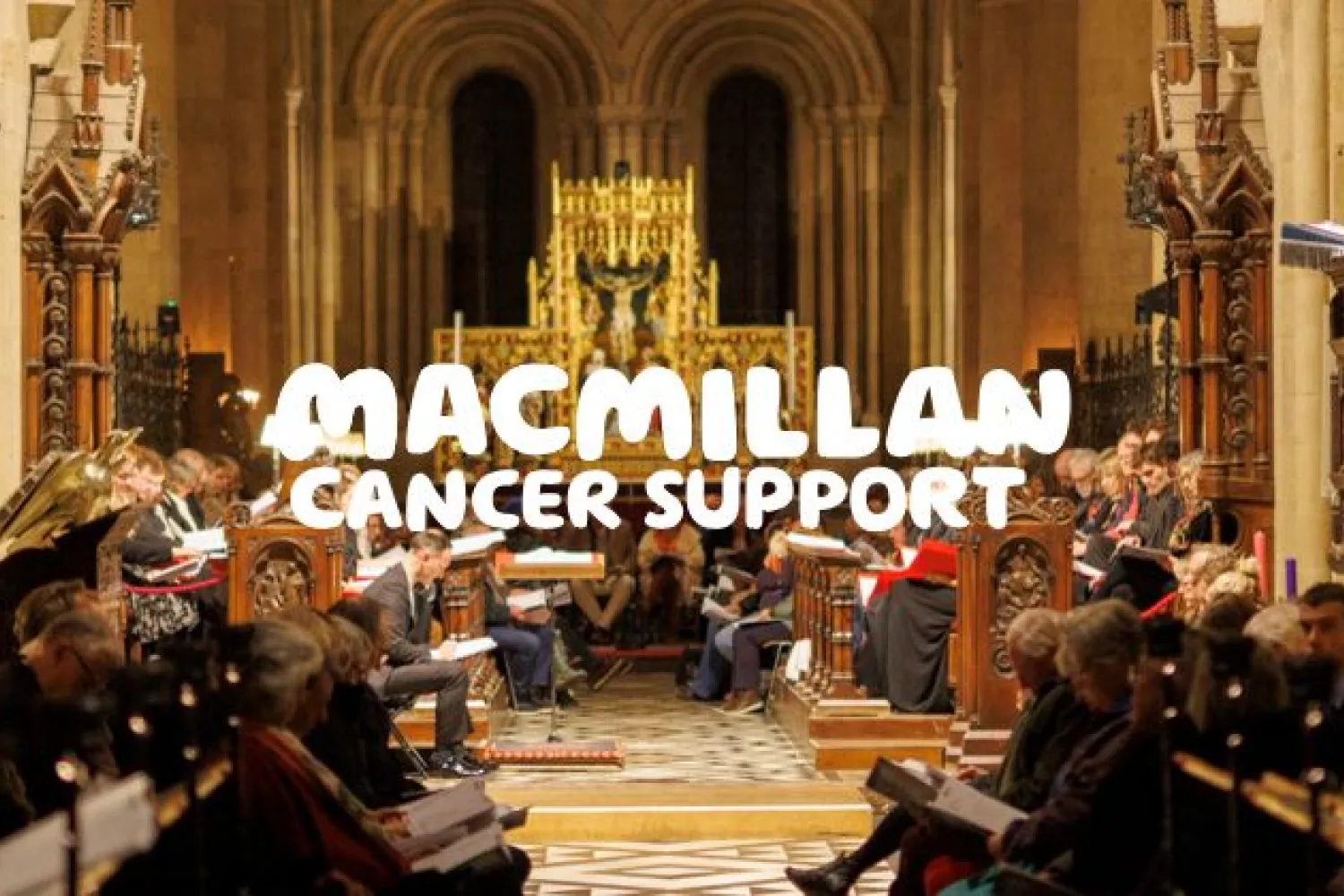 A reading from the pulpit during a Macmillan Cancer Support charity concert in the Cathedral