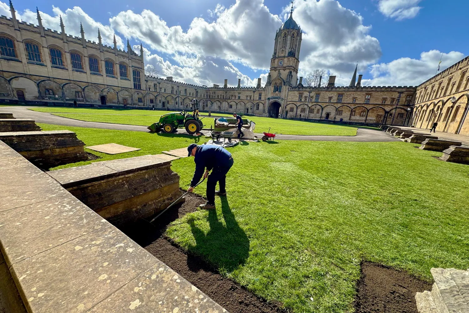 A gardener preparing a Tom Quad gully bed for planting