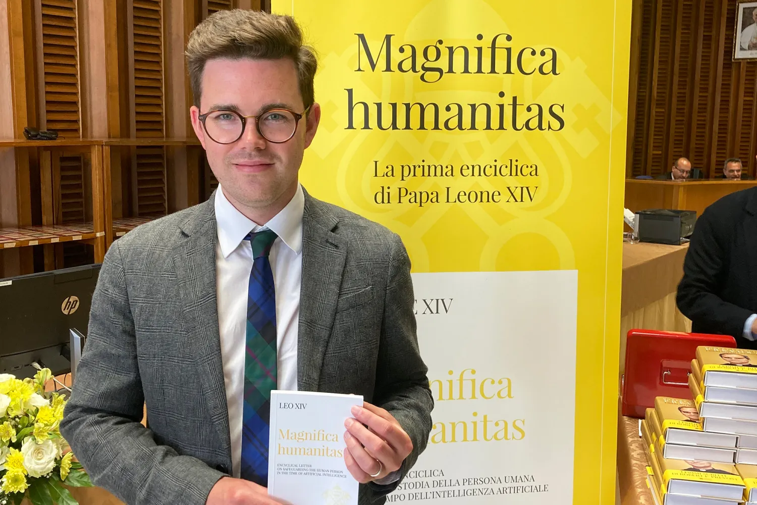Dr Sam Tranter at the Vatican with a copy of Magnifica Humanitas