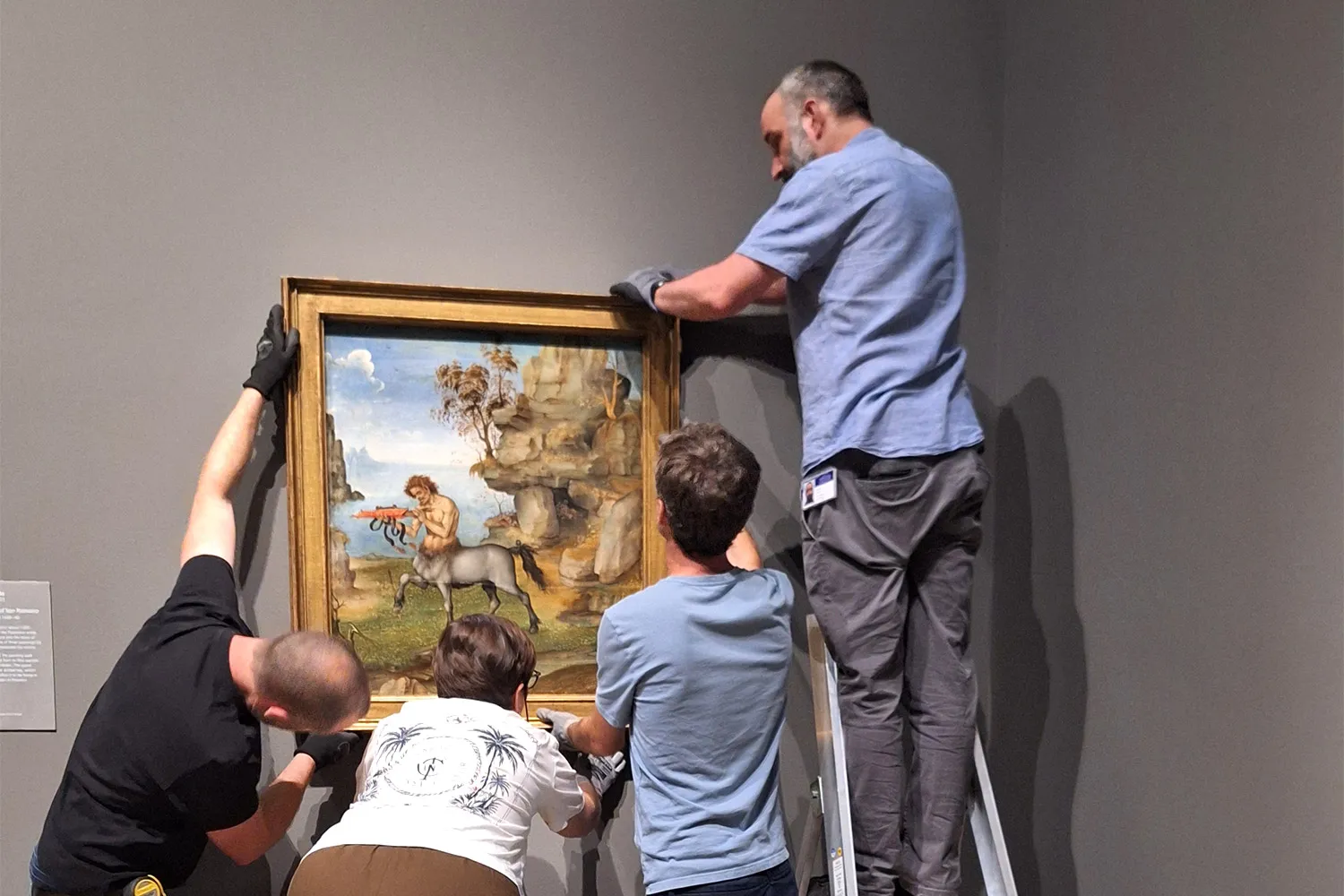'The Wounded Centaur' being hung in the National Gallery