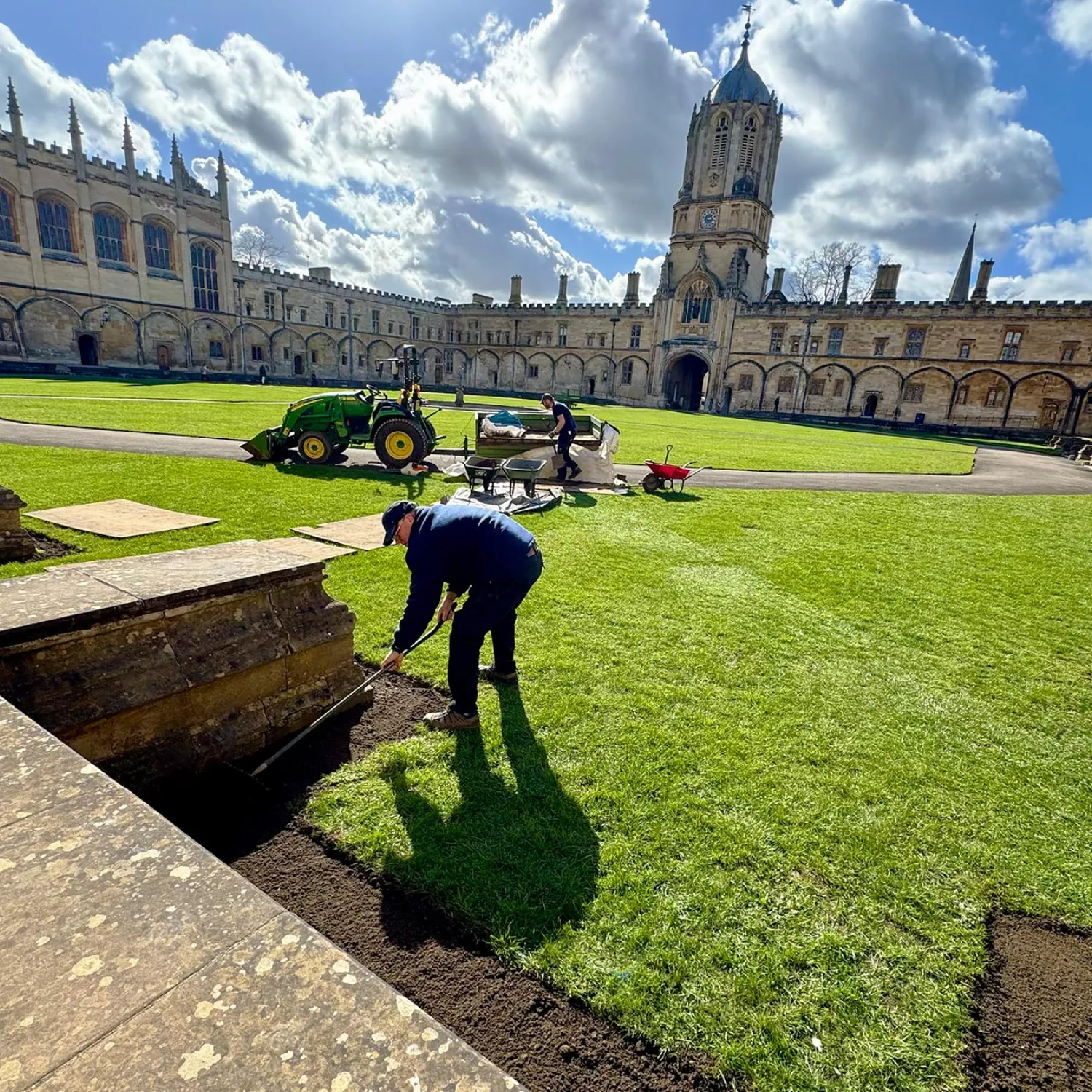 A gardener preparing a Tom Quad gully bed for planting