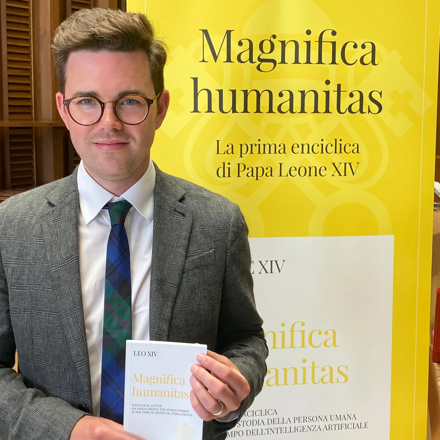 Dr Sam Tranter at the Vatican with a copy of Magnifica Humanitas